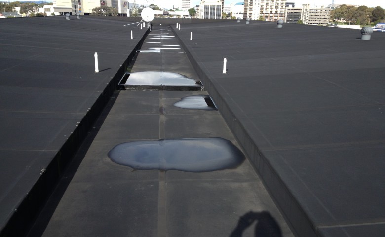 pre construction delamination on roof parapet cladding