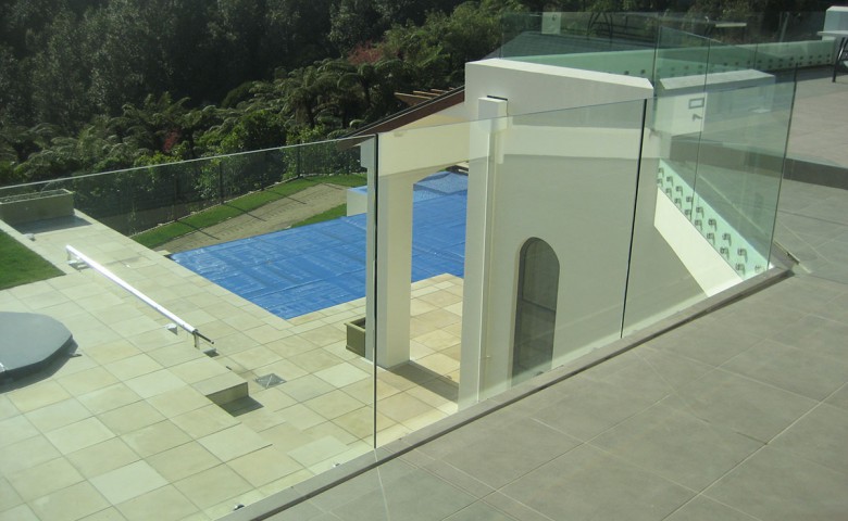 glass balcony view of new dwellings swimming pool and spa area